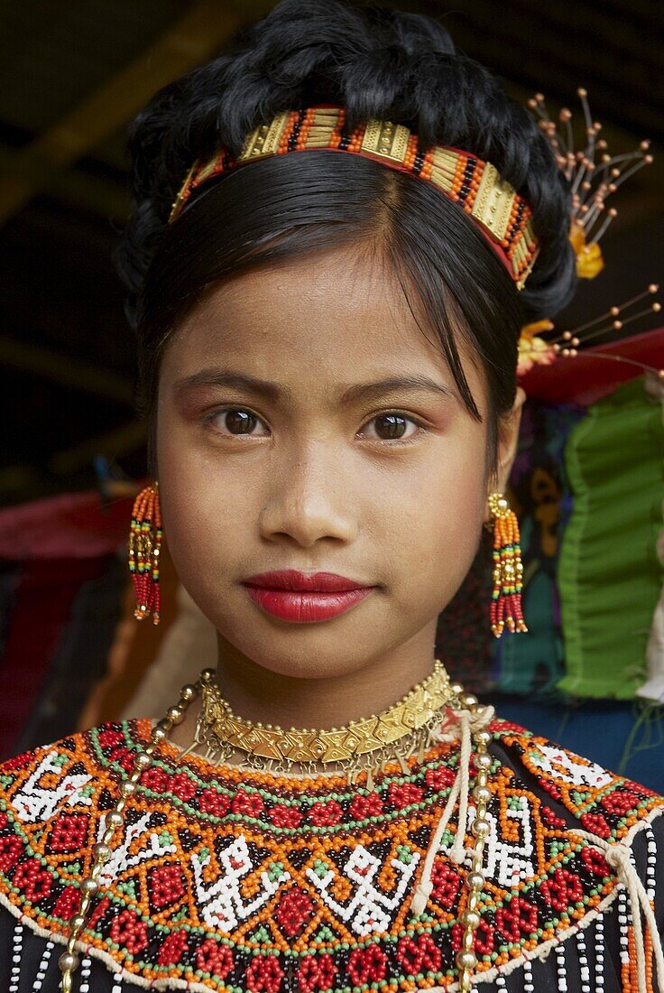 Young Toraja girl in traditional costume at funeral ceremony, Tana Toraja, Sulawesi, Celebes, Indonesia, Southeast Asia, Asia