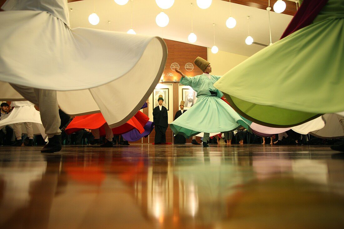 Whirling dervish performance in Silvrikapi Meylana cultural center, Istanbul, Turkey, Europe