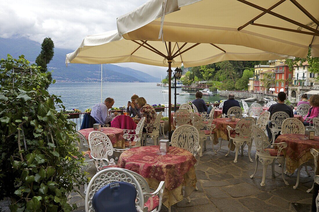 Lakeside view of cafe in the medieval village of Varenna, Lake Como, Lombardy, Italian Lakes, Italy, Europe