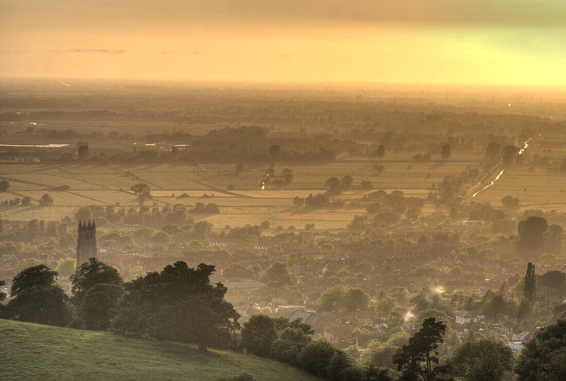 View of Glastonbury during sunset from Glastonbury Tor, Somerset, England, United Kingdom, Europe