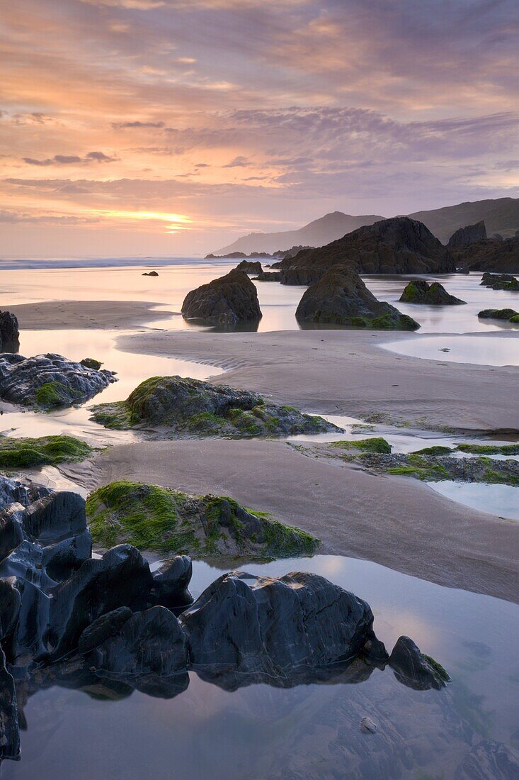 Rockpools and sand at Combesgate Beach in North Devon, England, United Kingdom, Europe