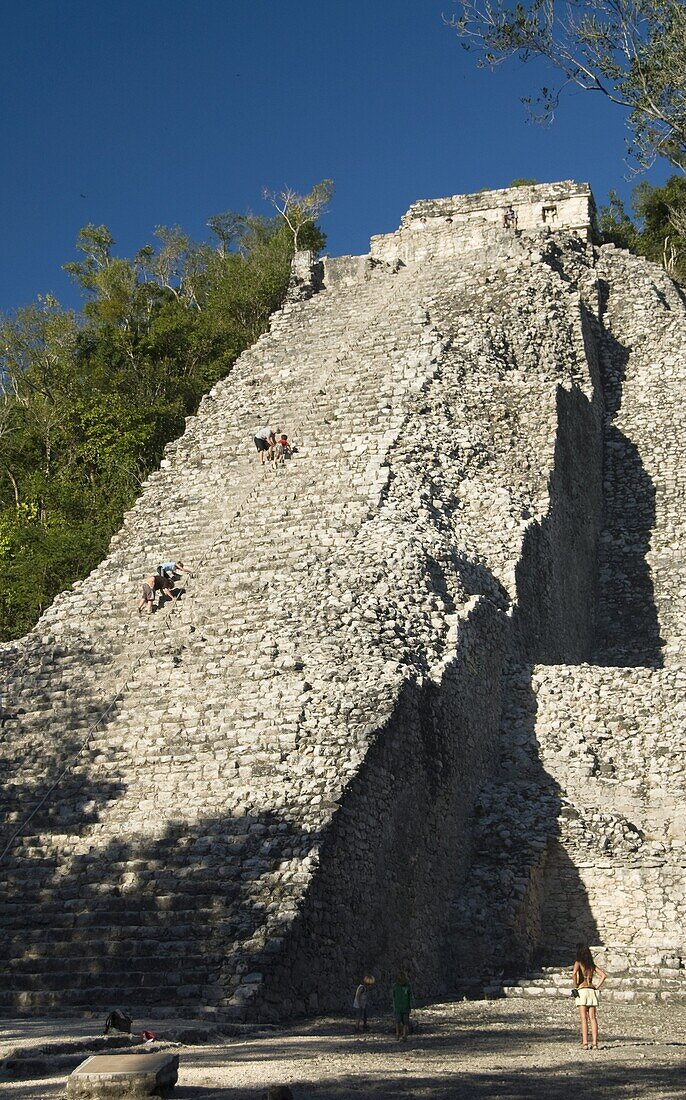 Tourists climbing the stairway, Nohoch Mul (Big Mound), Coba, Quintana Roo, Mexico, North America