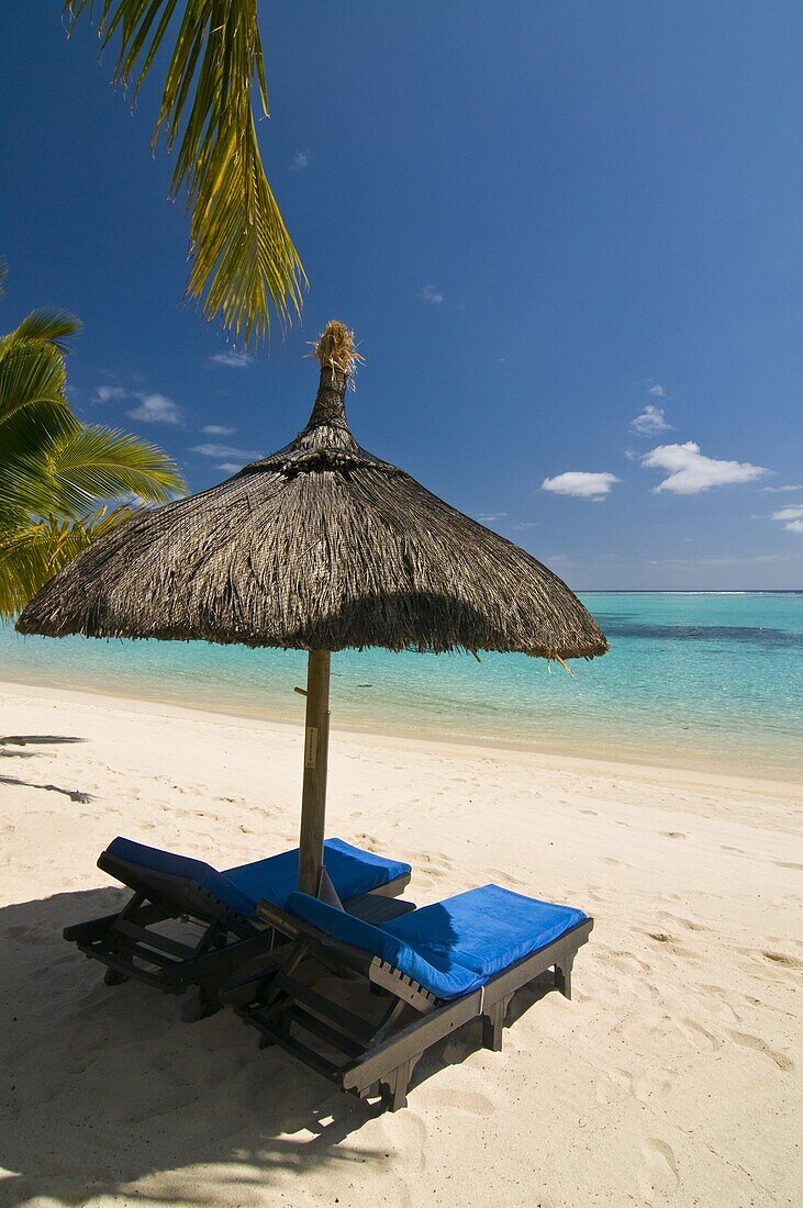 Sun lounger on the beach of the Beachcomber Le Paradis five star hotel, Mauritius, Indian Ocean, Africa