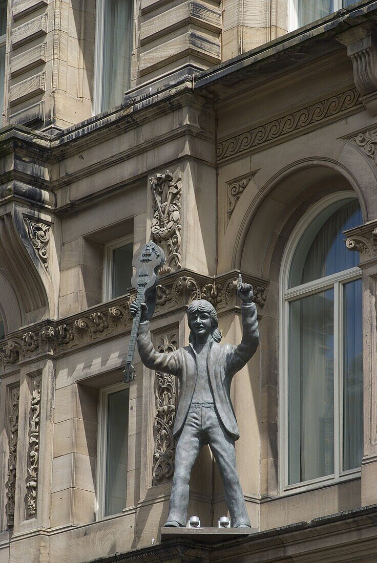 Statue of Paul McCartney outside the Hard Day's Night Hotel, Liverpool, Merseyside, England, United Kingdom, Europe