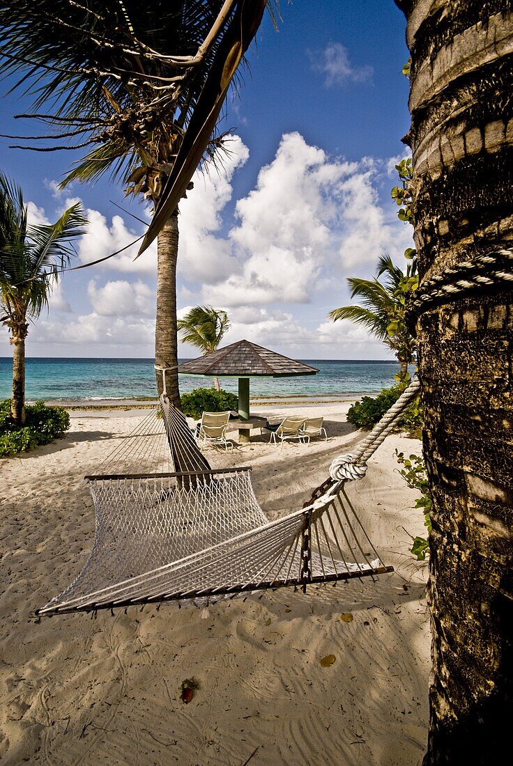 A hammock on an empty beach, Antigua, Leeward Islands, West Indies, Caribbean, Central America