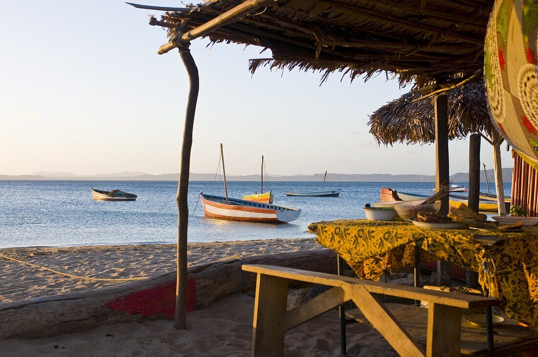 Beach cottage and fishing boats near Diego Suarez (Antsiranana), Madagascar, Indian Ocean, Africa