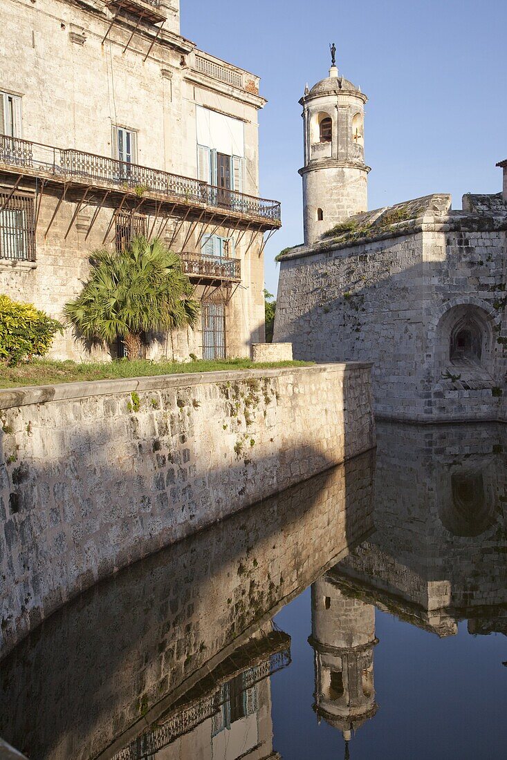Reflection in moat of the tower of the Fortress of Real Fuerza in Old Havana, UNESCO World Heritage Site, Havana, Cuba, West Indies, Central America