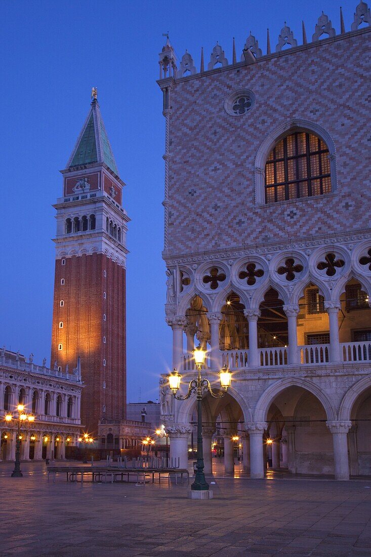 Daybreak view of Piazza San Marco (St. Mark's Square) and Campanile with Doges Palace, Venice, UNESCO World Heritage Site, Veneto, Italy, Europe