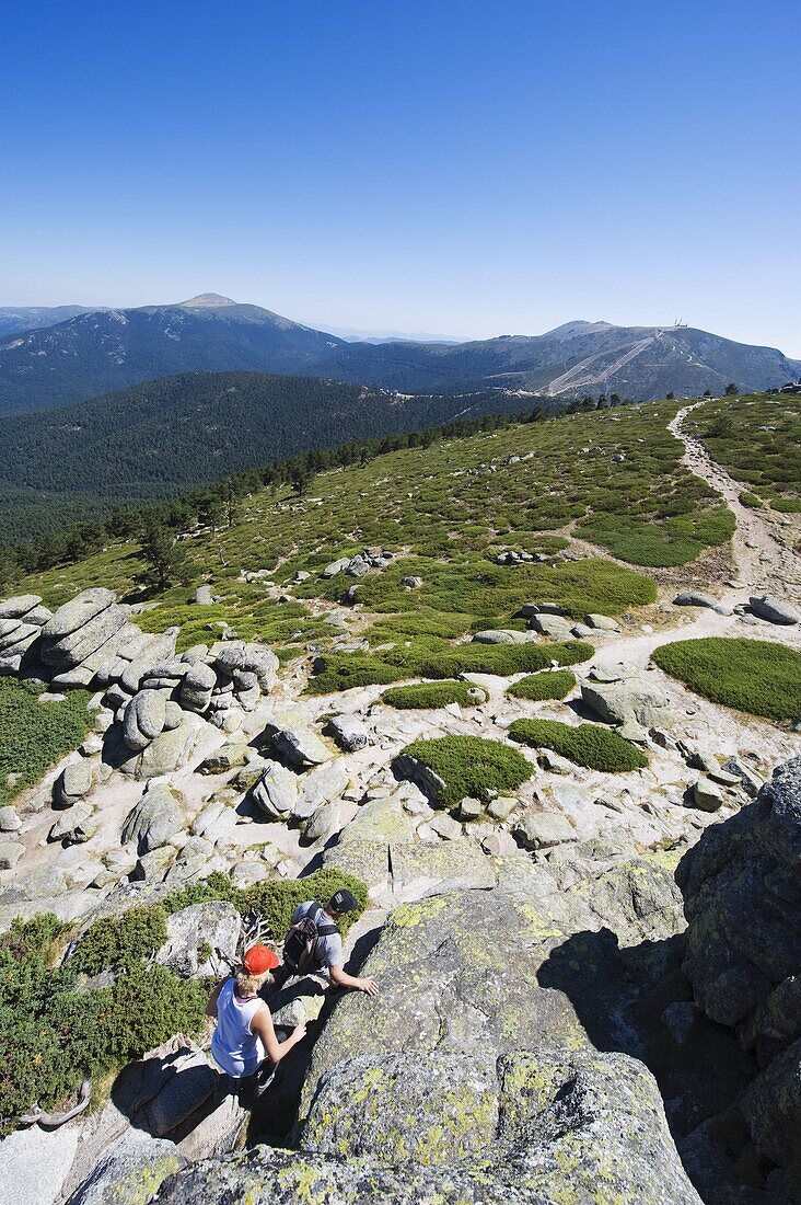 Hikers at Sietos Picos (Seven Peaks), in Guadarrama, Madrid, Spain, Europe