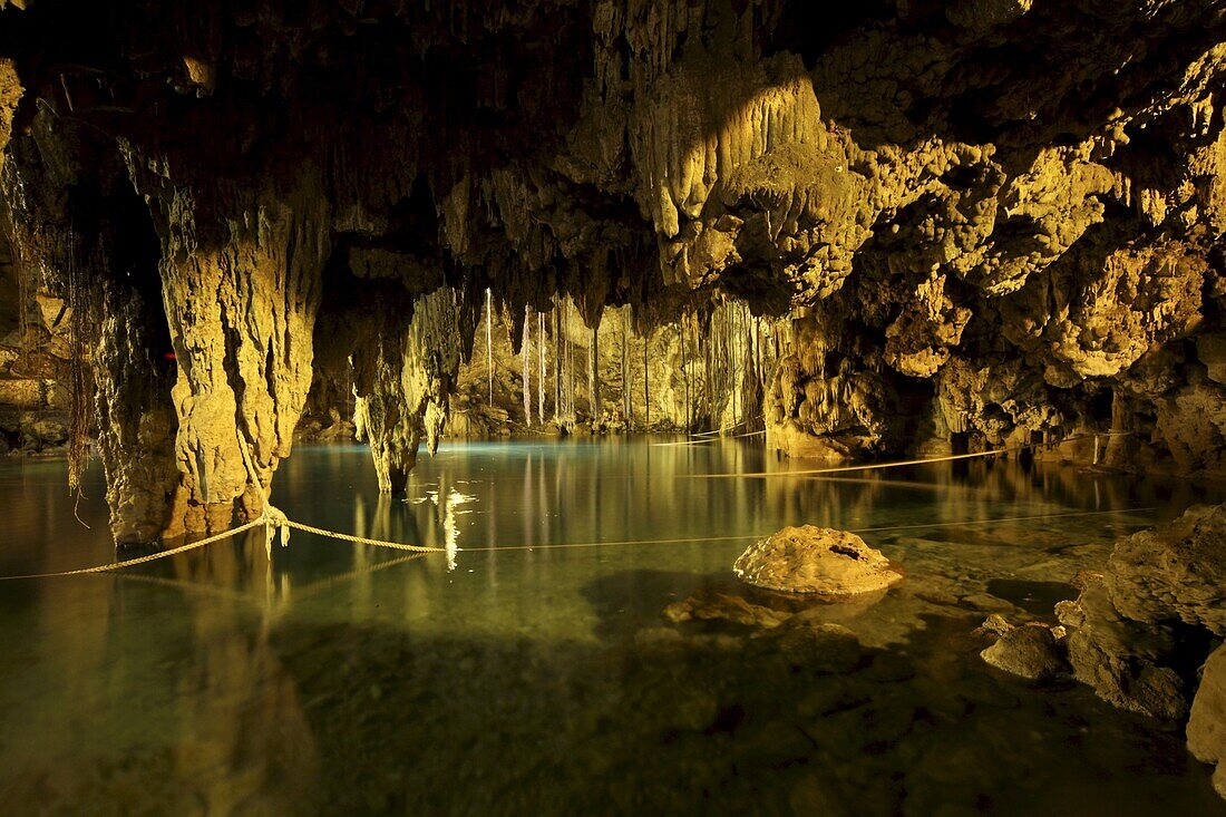 Cenote Dzitnup, underground sinkholes which has only one natural source of light, Yucatan, Mexico, North America