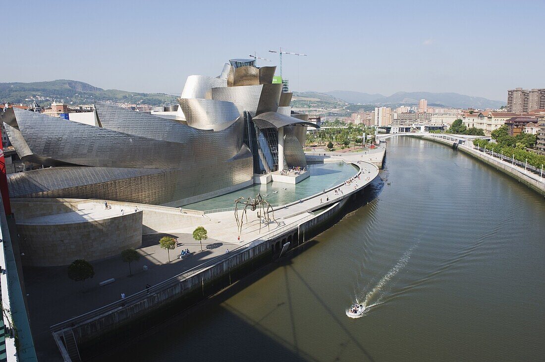 The Guggenheim, designed by Canadian-American architect Frank Gehry, on the Nervion River, Bilbao, Basque country, Spain, Europe