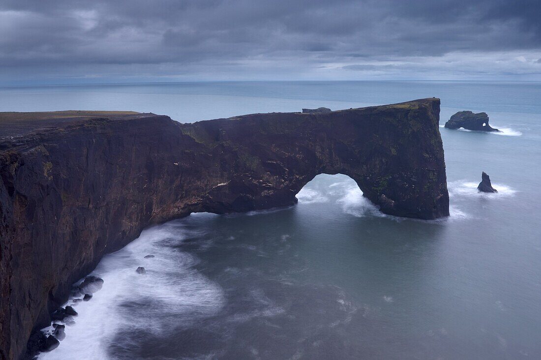Dyrholaey natural arch, southernmost point in Iceland, at dusk, near Vik, Iceland, Polar Regions