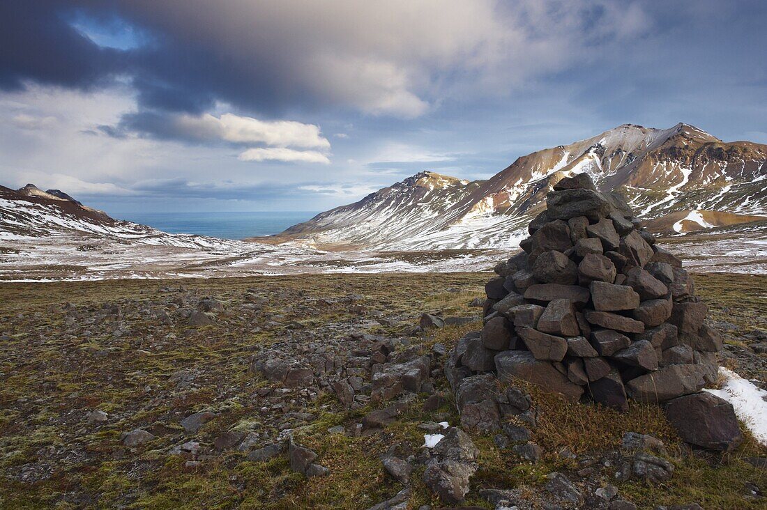Cairn and mountains in Brunavik valley, a favourite for hikers, Borgarfjorur Eystri fjord, East Fjords area, Iceland, Polar Regions