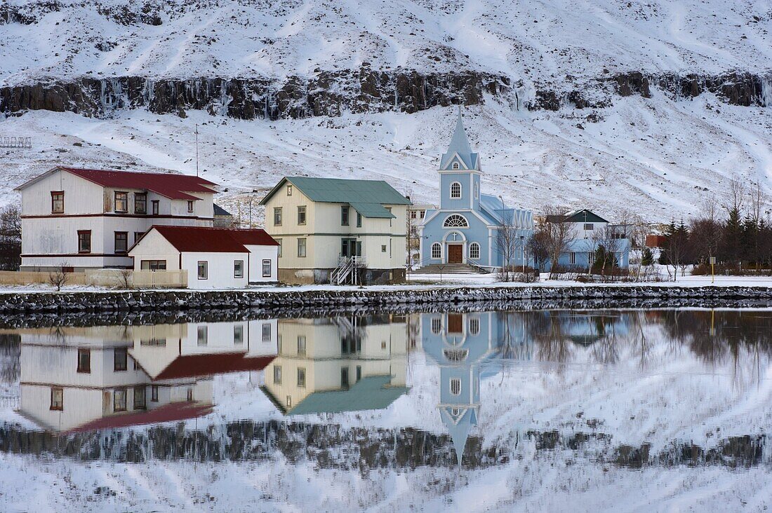 Traditional wooden church, built in 1922, at Seydisfjordur, a town founded in 1895 by a Norwegian fishing company, now main ferry port to and from Europe in the East Fjords, Iceland, Polar Regions