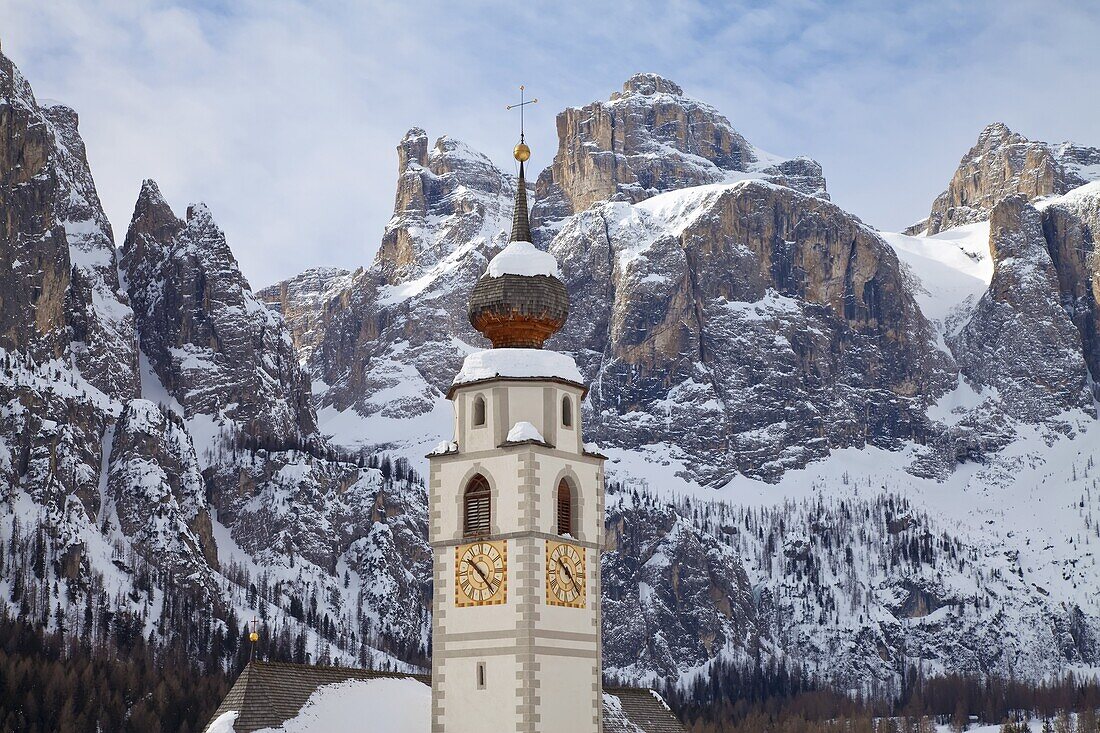 The church and village of Colfosco in Badia,  1645m,  and Sella Massif range of mountains under winter snow,  Dolomites,  South Tirol,  Trentino-Alto Adige,  Italy,  Europe