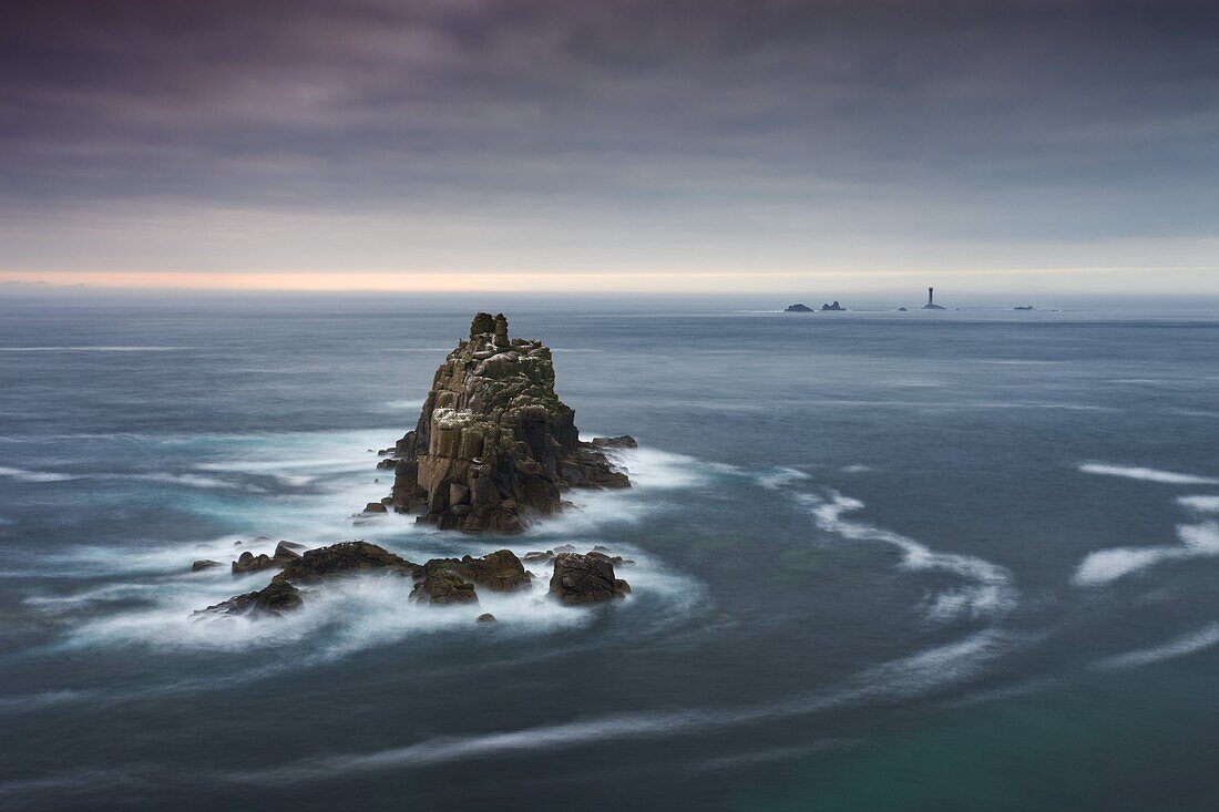 The Armed Knight rock stack and Longships Lighthouse off the coast at Land's End,  Cornwall,  England,  United Kingdom,  Europe