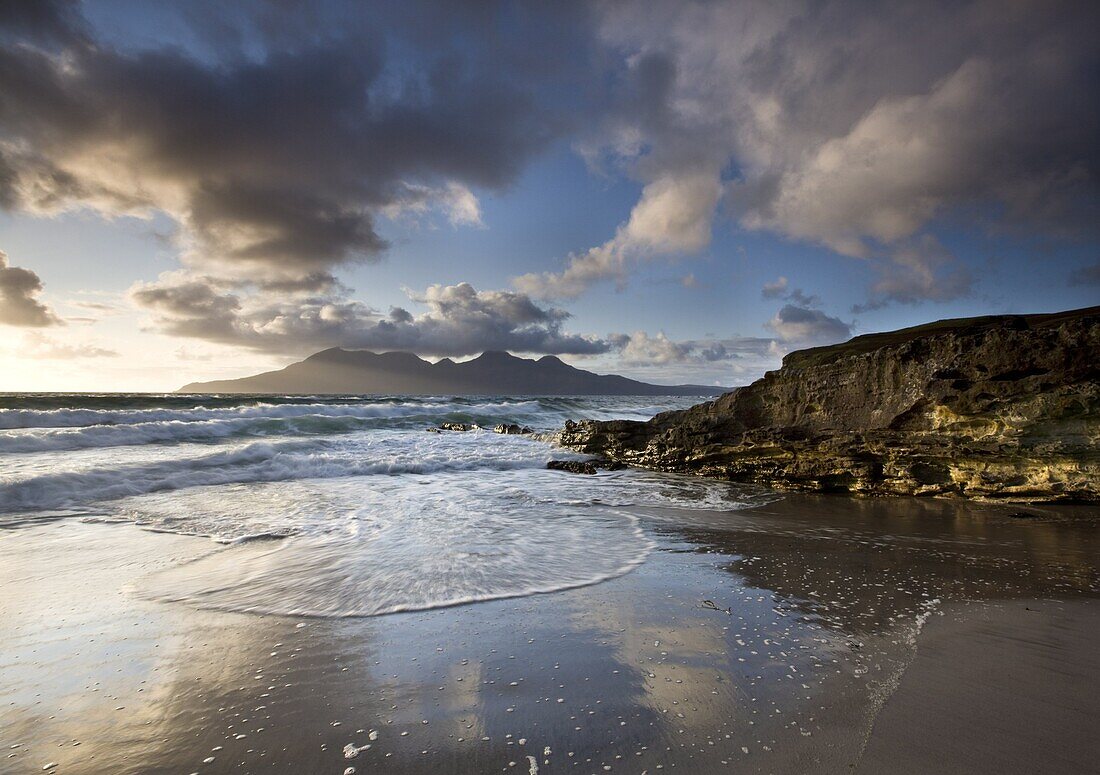 View towards Isle of Rum from Singing Sands (Camas Sgiotaig), Isle of Eigg, Inner Hebrides, Scotland, United Kingdom, Europe