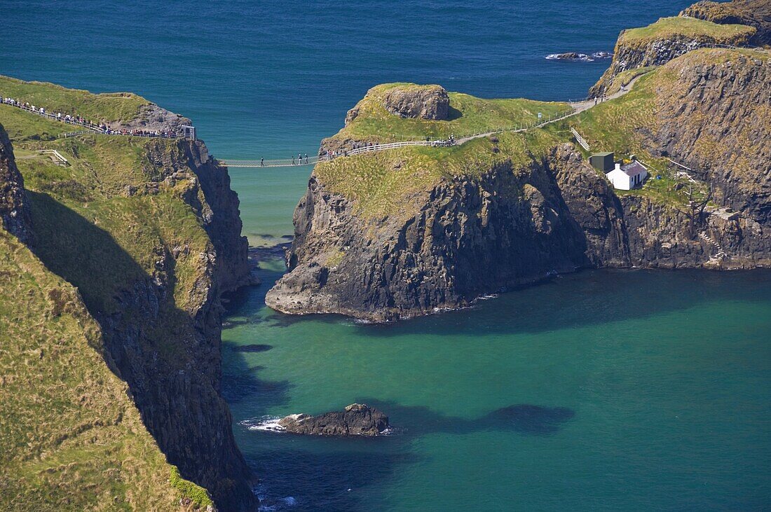 Carrick-a-Rede rope bridge to Carrick Island, Larrybane Bay, Ballintoy, Ballycastle, County Antrim, Ulster, Northern Ireland, United Kingdom, Europe