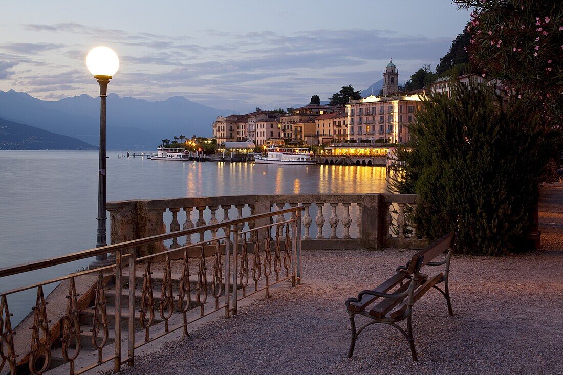 Promenade and lake at dusk, Bellagio, Lake Como, Lombardy, Italian Lakes, Italy, Europe