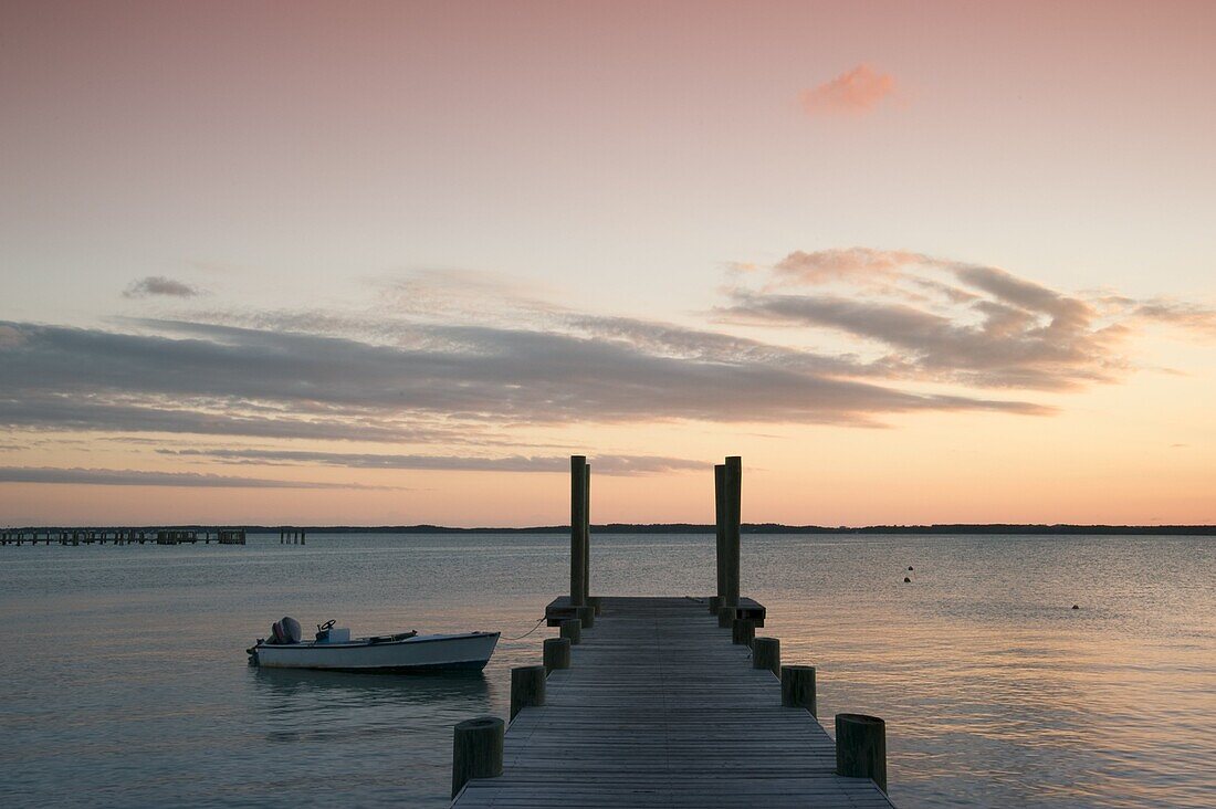 A dock at sunset in Dunmore Town, Harbour Island, Eleuthera, The Bahamas, West Indies, Atlantic, Central America