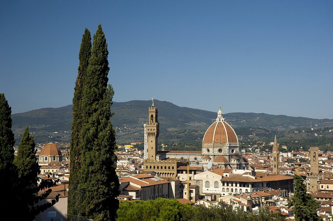 A view over teracotta rooftops to the Duomo and Campanile, Florence, UNESCO World Heritage Site, Tuscany, Italy, Europe