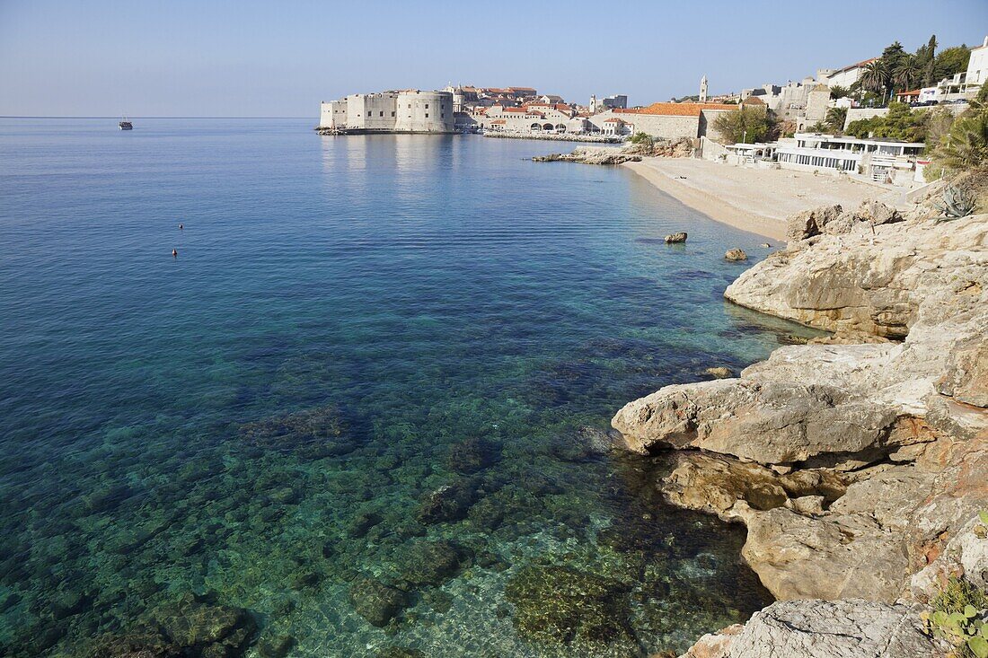 View of Old Town Dubrovnik with rocky coast, Dubrovnik, Croatia, Europe