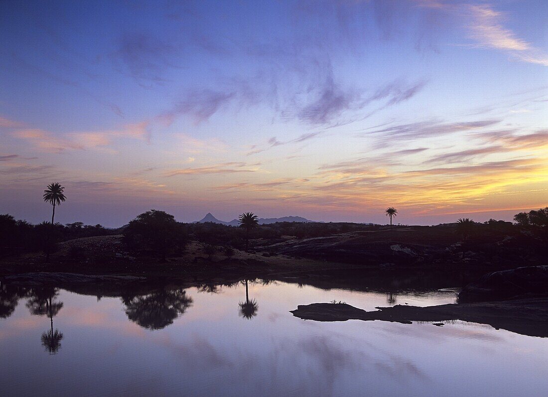 Sunrise over the lake at Fort Seengh Sagar in Rajasthan, India, Asia