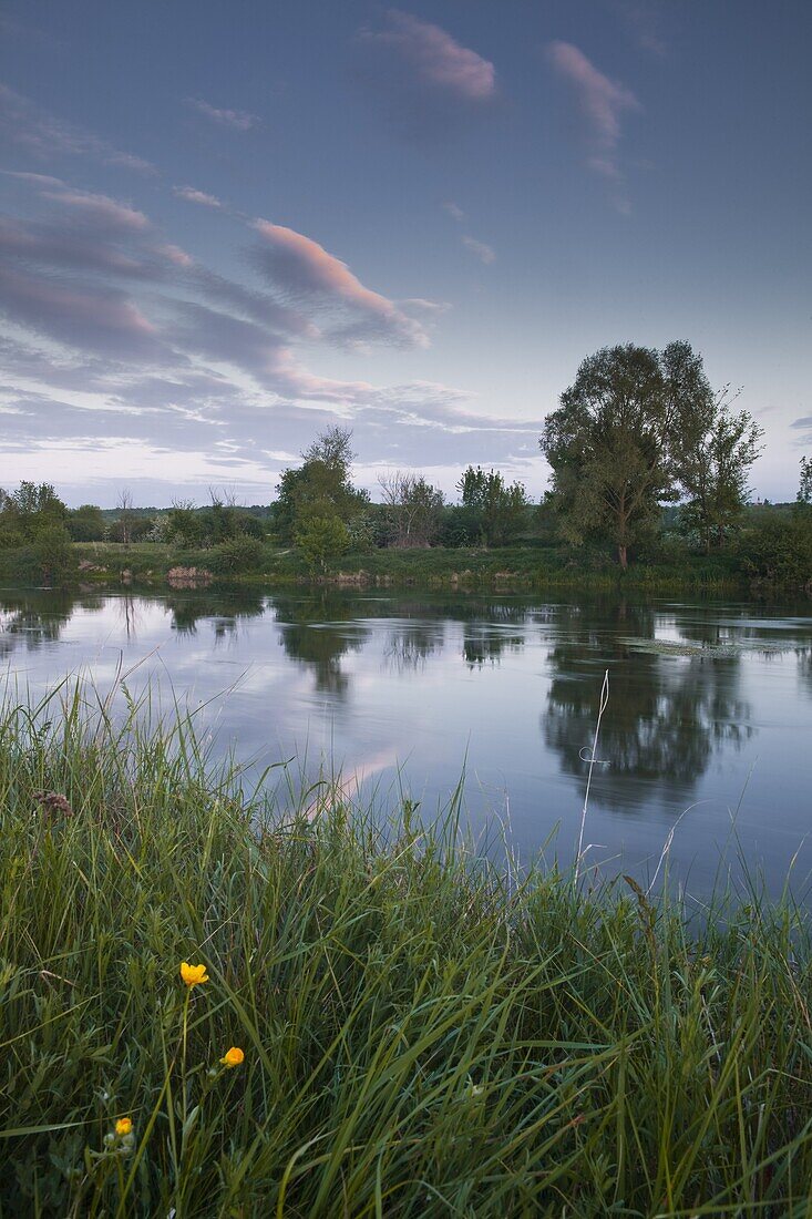 Low light and reflections across the River Cher near Villefranche-sur-Cher, Centre, France, Europe