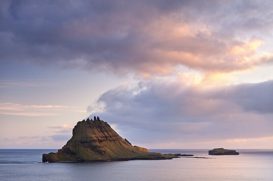 The islet of Tindholmur at the mouth of Sorvagsfjordur, Vagar Island, Faroes Islands, Denmark, Europe