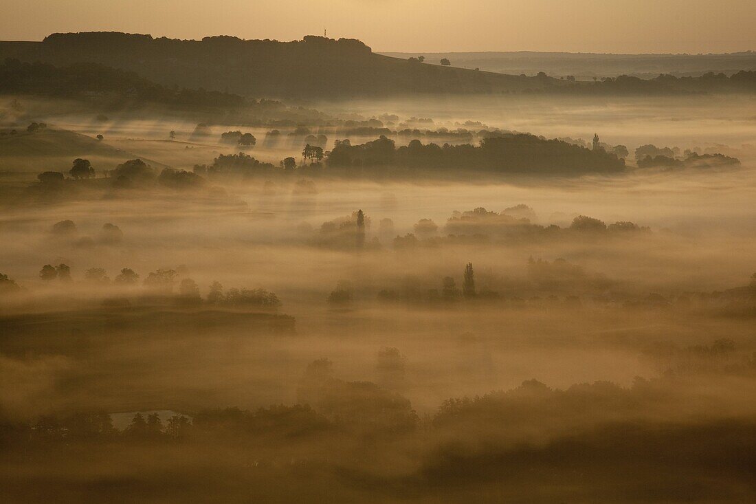 Sunrise over misty valley from the terrace, Vezelay, Burgundy, France, Europe