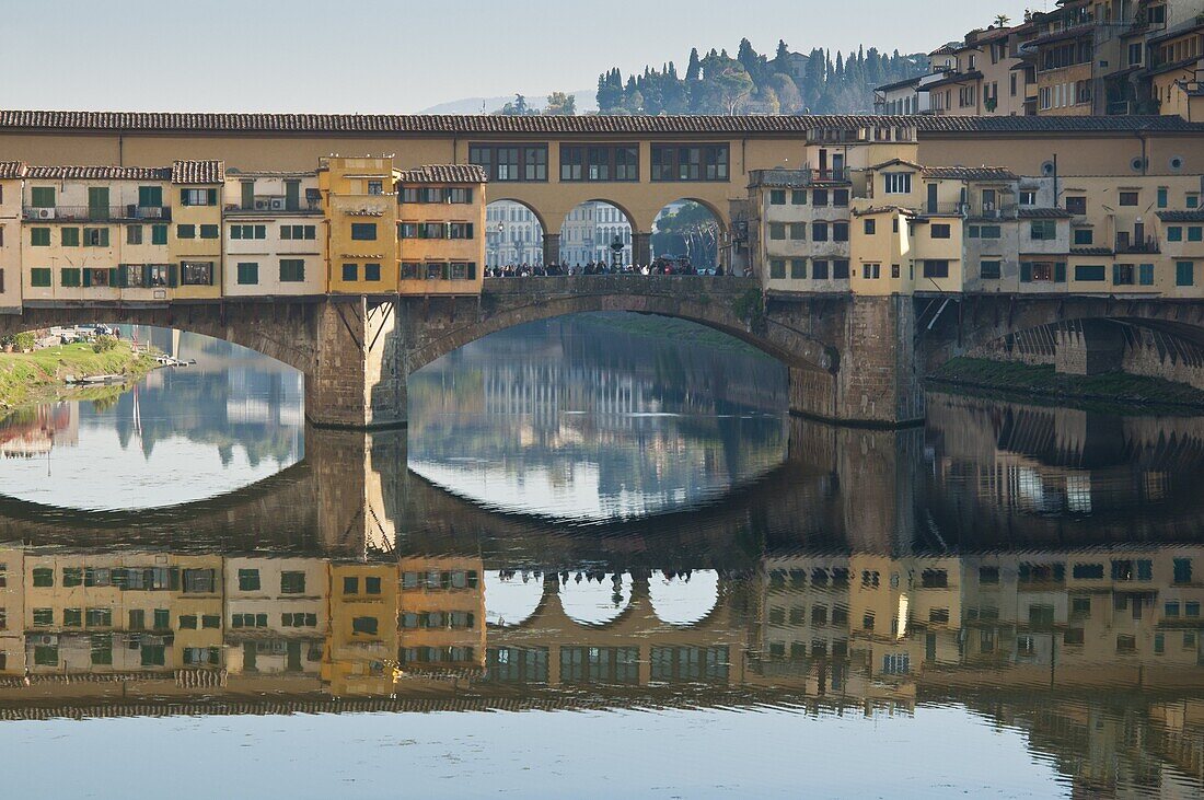 Ponte Vecchio reflected in the River Arno, Florence, UNESCO World Heritage Site, Tuscany, Italy, Europe