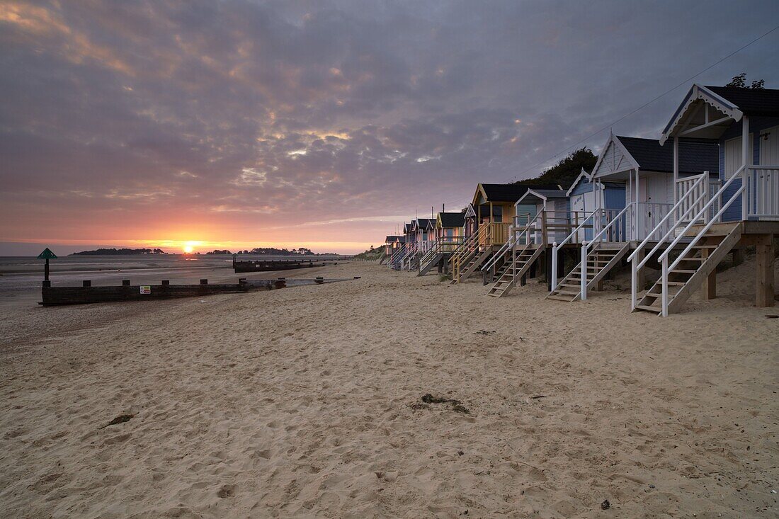 Beach, beach huts and a summer sunrise, Wells next the Sea, Norfolk, England, United Kingdom, Europe