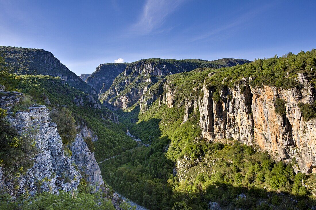 Looking down in the early evening onto the more open stretches of the Vikos Gorge, near Vitsa and the Misius Bridge in spring, Epirus, Greece, Europe