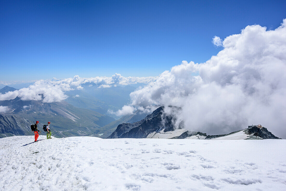 Mountaineers descending over normal route from Grossglockner, Grossglockner, High Tauern, East Tyrol, Austria
