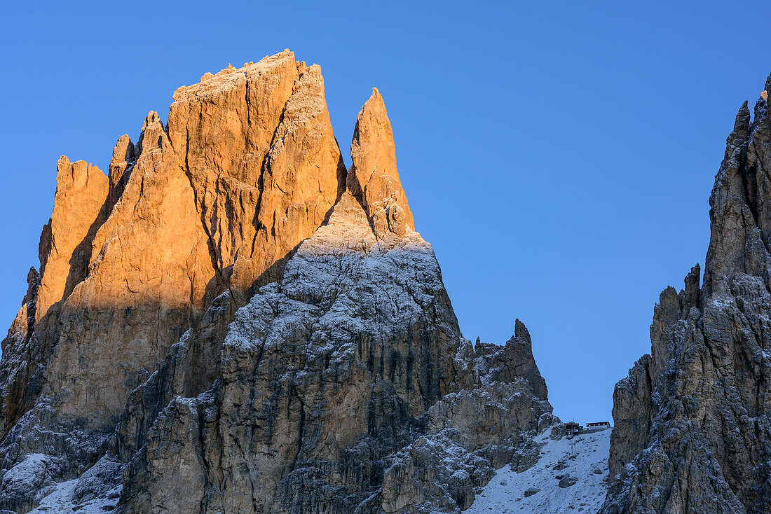 Fuenffingerspitze and Langkofelscharte with hut Demetzhuette in alpenglow, Langkofel group, Dolomites, UNESCO World Heritage Dolomites, Trentino, Italy