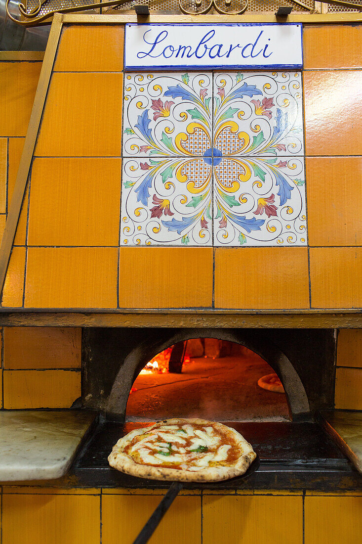 Pizza, Pizzeria Lombardi, simple and traditional, wood-fired oven, yellow tiles, oven entrance, dough, pastry, popular, fast-food, Italian, restaurant, lifestyle, culture, Italian food, Naples, Italy
