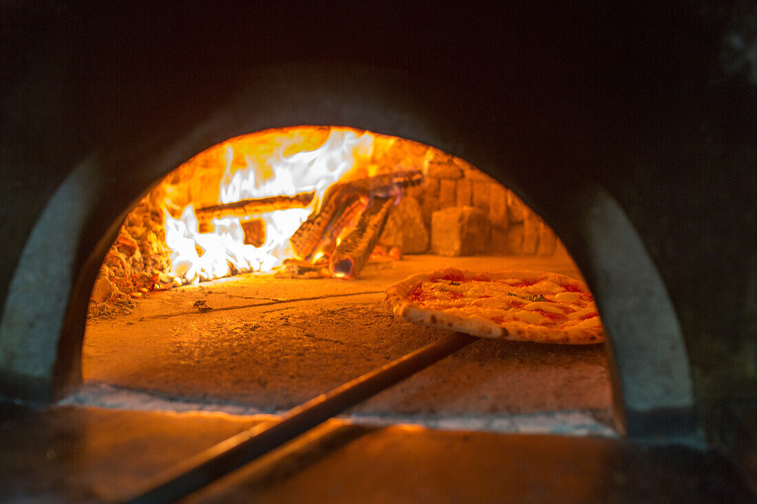 Pizza, Pizzeria Lombardi, simple and traditional, wood-fired oven, oven entrance, dough, pastry, popular, fast-food, Italian, restaurant, lifestyle, culture, Italian food, Naples, Italy