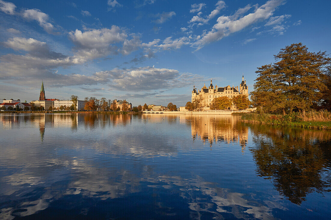 Cathedral and castle reflecting in lake Burgsee, Schwerin, Mecklenburg Western Pomerania, Germany
