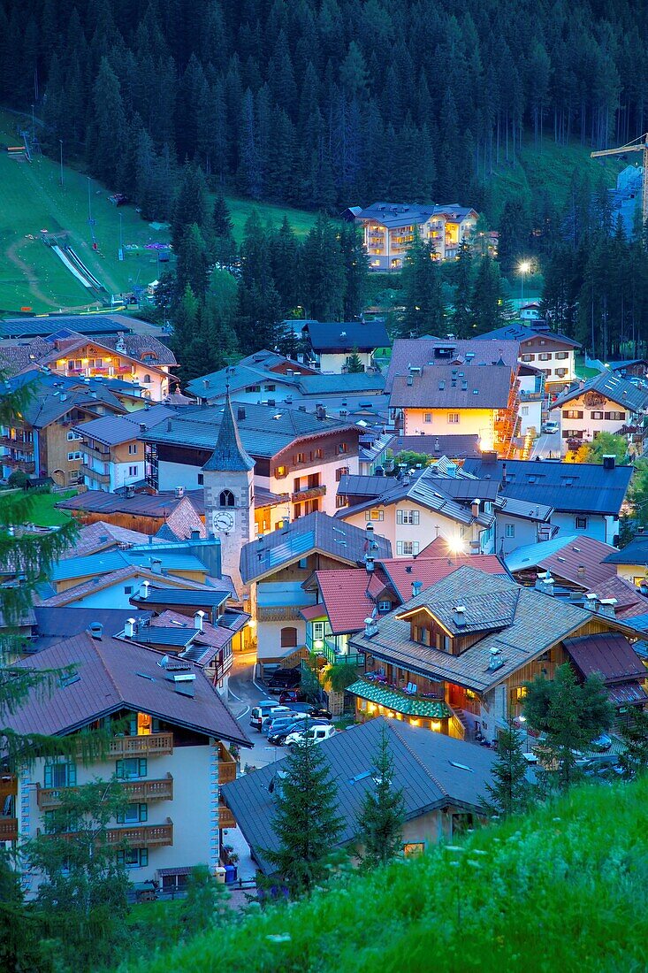 View over town at dusk, Canazei, Val di Fassa, Trentino-Alto Adige, Italy, Europe