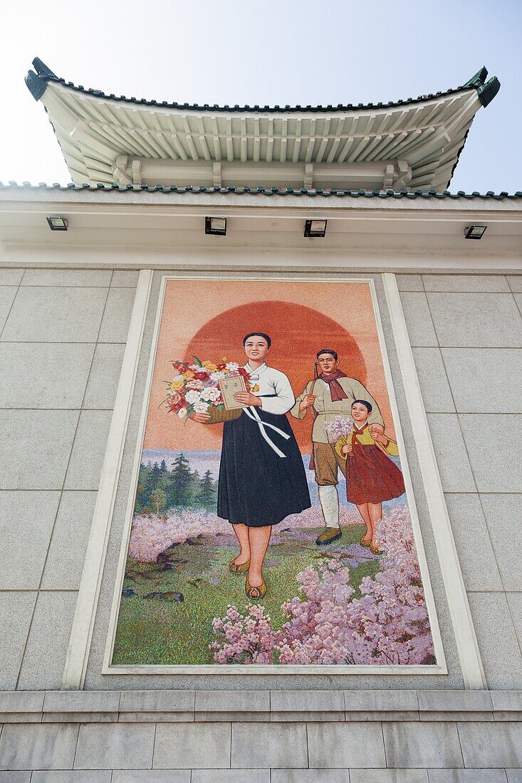 Colourful wall paintings outside the National Theatre, Pyongyang, Democratic People's Republic of Korea (DPRK), North Korea, Asia