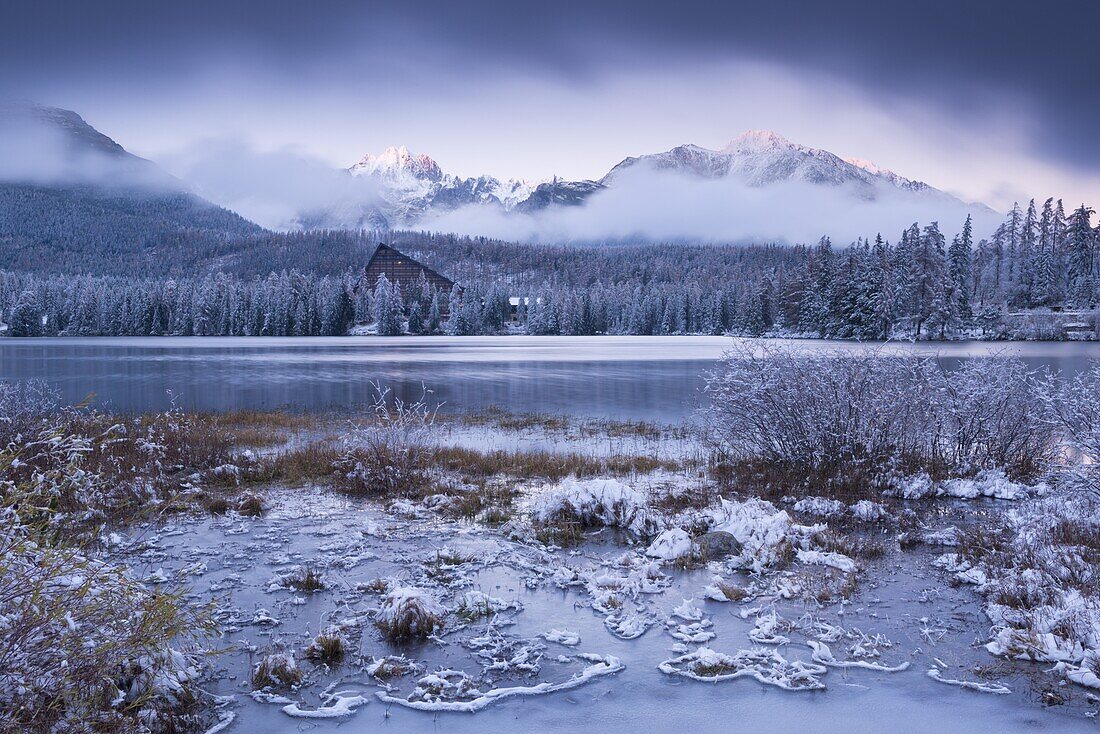 Winter snow and ice at Strbske Pleso in the High Tatras in winter, Slovakia, Europe