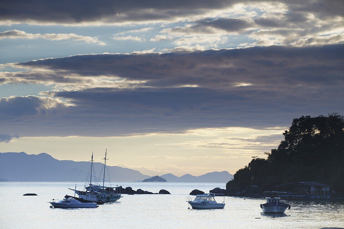 Boats moored at Vila do Abraao at dawn, Ilha Grande, Rio de Janeiro State, Brazil, South America