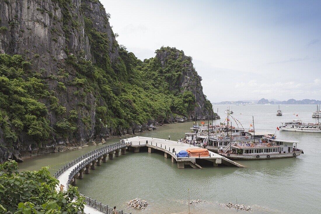 A boat docking station at one of the many isalnds in Ha Long Bay, UNESCO World Heritage Site, Vietnam, Indochina, Southeast Asia, Asia