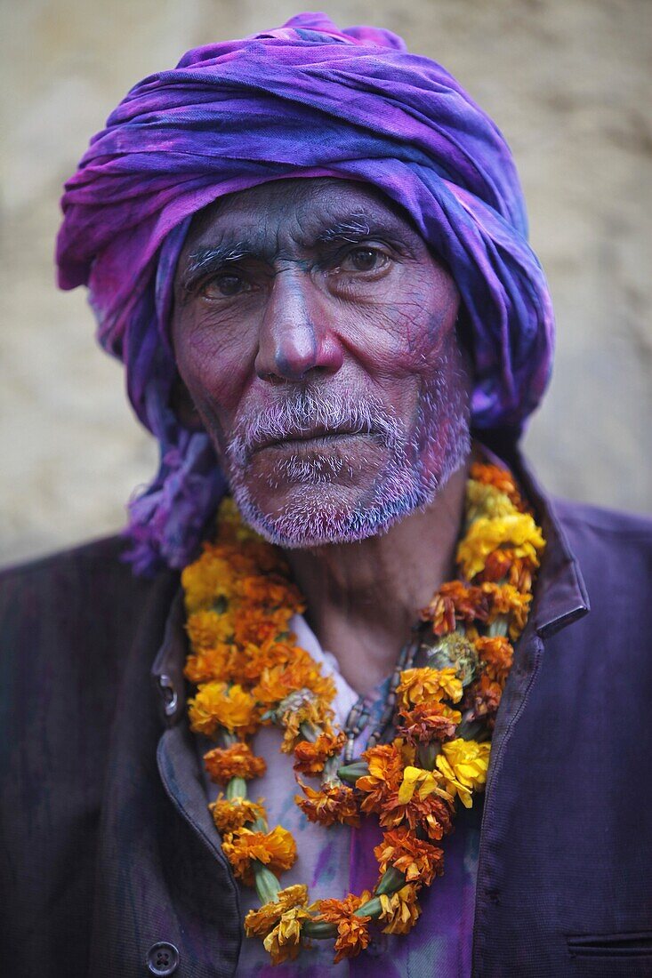 Man celebrating Holi festival, Nandgaon, Uttar Pradesh, India, Asia