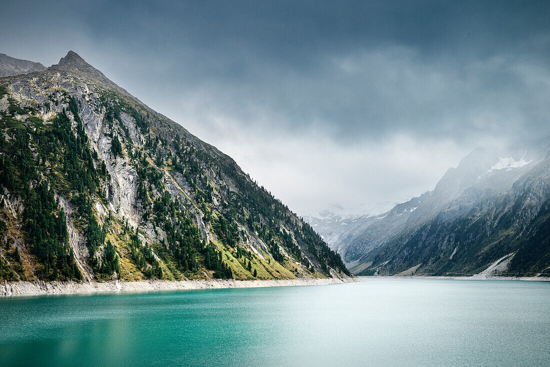 Turquoise glacial water at Schlegeis Dam, Zillertal, Tyrol, Austria, Alps