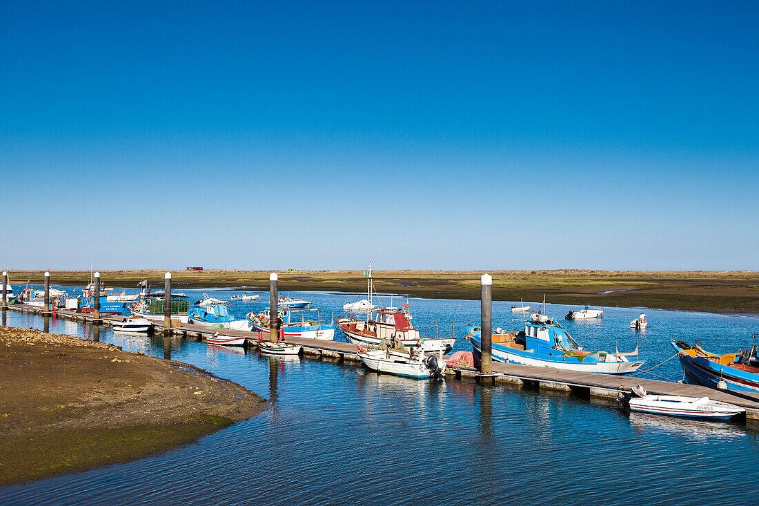 Boats in the lagoon, Cabanas near Tavira, Algarve, Portugal