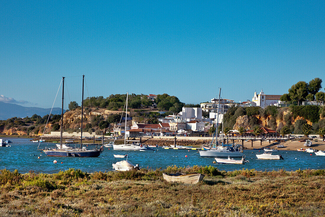 View across Ria de Alvor towards Alvor, Algarve, Portugal