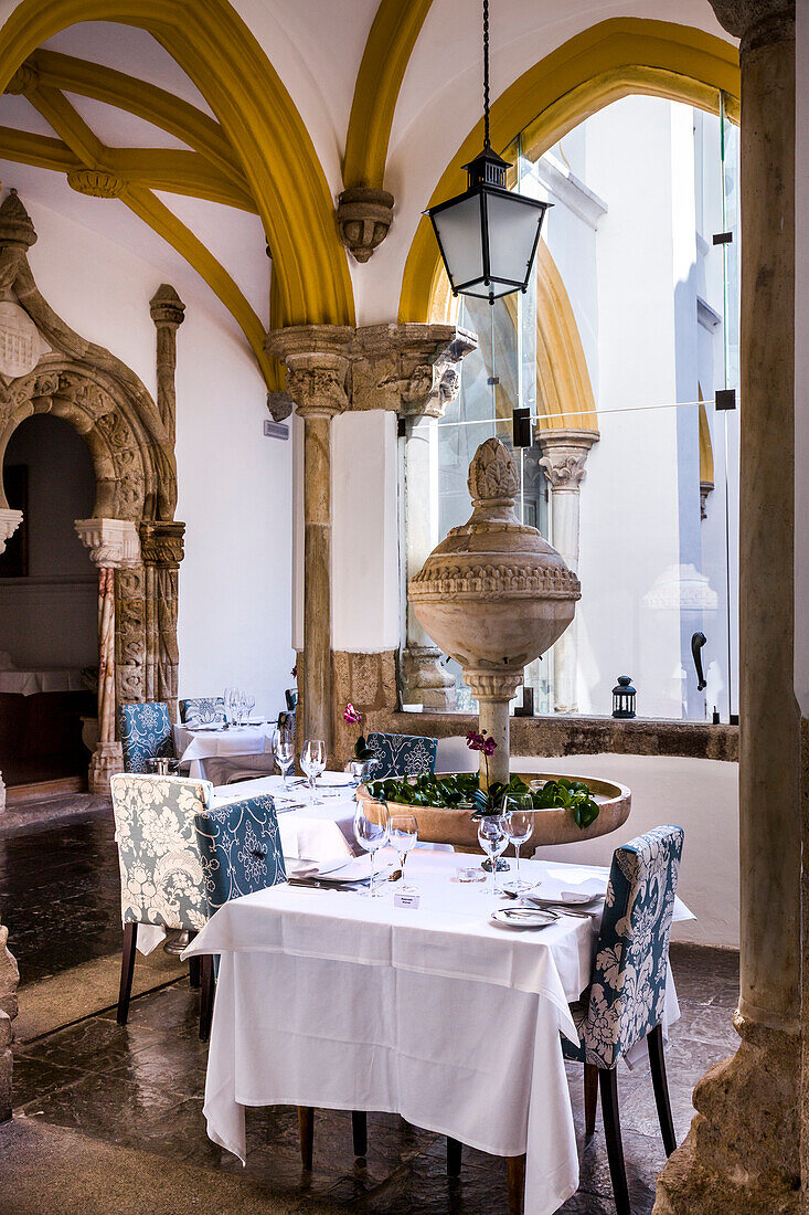 Restaurant in cloister, Pousada dos Loios, a former monastery, Evora, Alentejo, Portugal