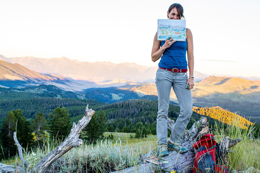 Artist shows off her mountain drawing of Montana's Gallatin Range