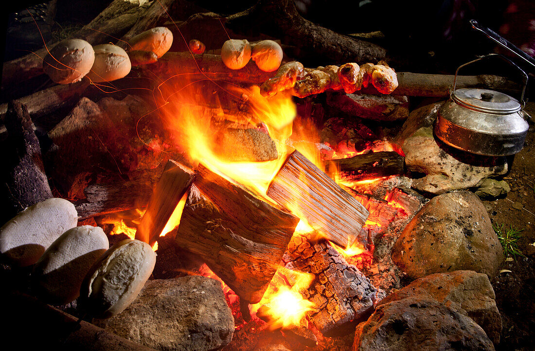 bread rolls on a campfire